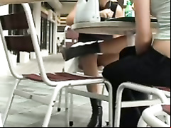 Filming her white panties under the table