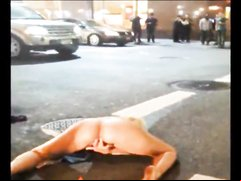 Naked drunk woman in the street